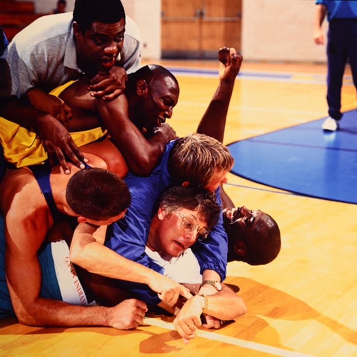 Friedkin (being mobbed on set, above) built his on-court cast around athletes, not actors.